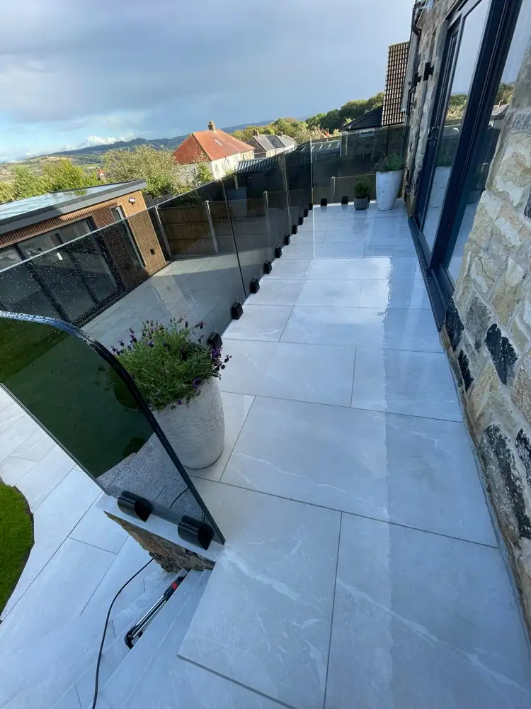 Porcelain patio with glass balustrade