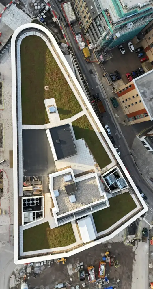 Drone view of a city centre green roof, Leeds